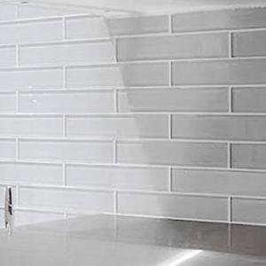 Room scene with Miki Glass tile by Centura in Light Grey