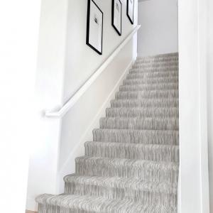 Room scene (stairs) with Clairbella carpet in Sterling