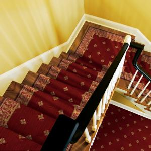 Stairway with Harry stair runner in Red Stone