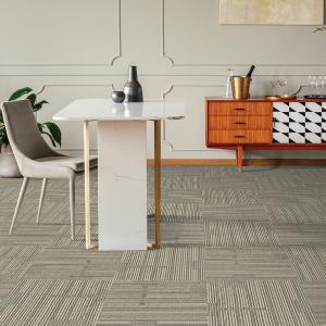 Room scene with Kinematic carpet tiles, by Beaulieu in Modern Grey