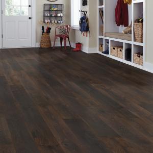 Room scene with Styleo laminate flooring from Torlys in Snyder Oak