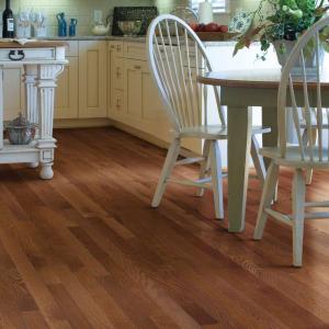 Room scene with Family Affair hardwood flooring from Shaw in Saddle