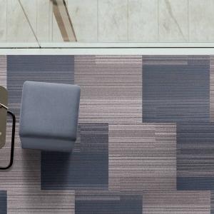 Office scene with Fraser carpet tiles by Centura, in Prussian Blue & Mars Grey