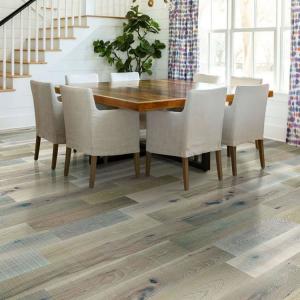 Room scene with Magnificent SFN waterproof engineered hardwood flooring from Shaw, in Frosted Hickory