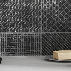 Kitchen backsplash with Coralstone tile in Black