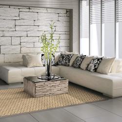 Modern living room scene with custom area rug in beige and taupe geometric pattern