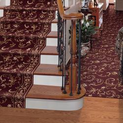 Room scene with ornate burgundy & gold carpet and matching stair runner
