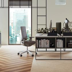 Office scene with two contrasting patterns of luxury vinyl flooring - herringbone wood and sand