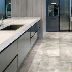 Modern kitchen scene with stone-look tile on floor