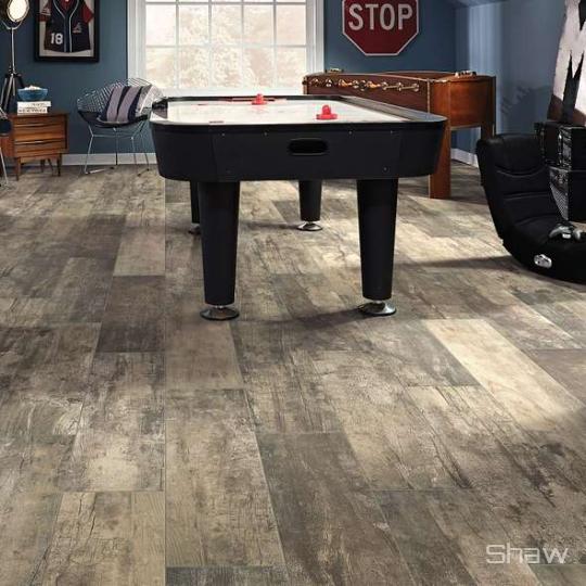 Room scene with Timeworn porcelain tile by Shaw, in Timber