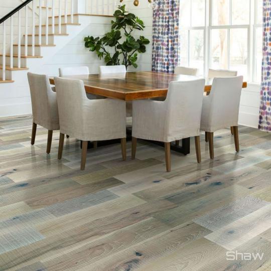 Room scene with Magnificent SFN waterproof engineered hardwood flooring from Shaw, in Frosted Hickory