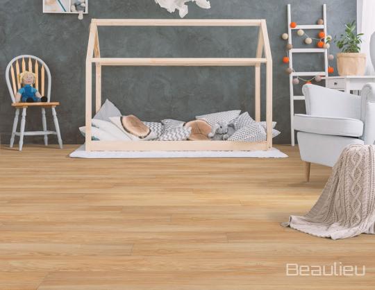 Room scene with Galaxī II Collection laminate flooring in Triangulum
