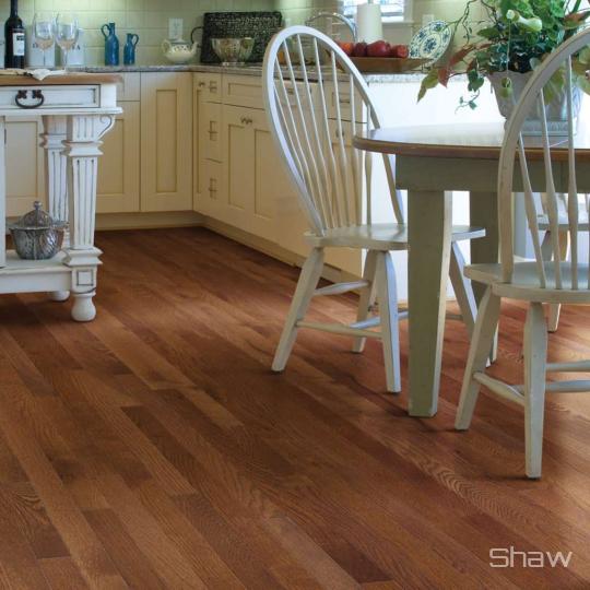 Room scene with Family Affair hardwood flooring from Shaw in Saddle