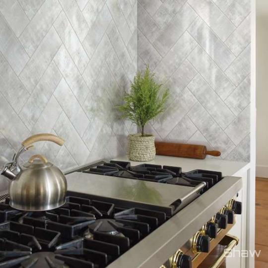 Kitchen scene with Cosmopolitan ceramic tile by Shaw, in Snow Crest